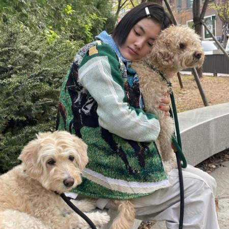 Kim Yong-ji with her furry friends Roux and Rye.